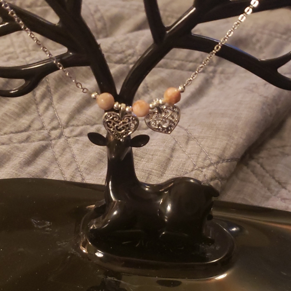 Hand made necklace with heart pendants